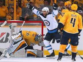 NASHVILLE, TN - MAY 10:  Paul Stastny #25 of the Winnipeg Jets reacts after a Jets goal against goalie Pekka Rinne #35 of the Nashville Predators during the first period in Game Seven of the Western Conference Second Round during the 2018 NHL Stanley Cup Playoffs at Bridgestone Arena on May 10, 2018 in Nashville, Tennessee.