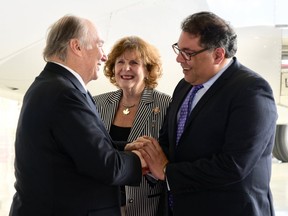 His Highness the Aga Khan, left, is greeted by Lois Mitchell, Lieutenant Governor of Alberta, and Calgary Mayor Naheed Nenshi upon arrival in Calgary Monday evening. Supplied photo, courtesy organizers of Aga Khan diamond jubilee celebrations in Calgary. May 7, 2018.