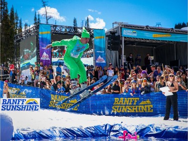 Cole Tweed before hitting a man-made pond of ice water during the 90th annual Slush Cup at Banff's Sunshine Village. The event marks the end of the ski season in Alberta.