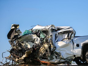 The wreckage of a pickup truck that collided with a semi-truck on Highway 22X early Tuesday morning, May 22.