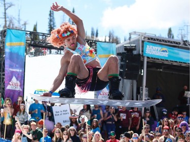 Alex Eyre before hitting a man-made pond of ice water during the 90th annual Slush Cup at Banff's Sunshine Village. The event marks the end of the ski season in Alberta.