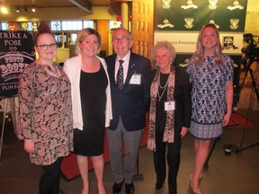 Pictured at the Strathcona-Tweedsmuir School Alumni Association 11th Annual alumni dinner is Distinguished Alumni Award recipient Prostate Cancer Centre executive director Pam Heard, (class of '73) second from left, with her family (from left) daughter Pippa Ruddy, parents Dick and Lois Haskayne and daughter Katie Ruddy. Heard joins other distinguished  alumni the likes of Donald Cross ('47), Vinay Ruparell ('80) and David Dover ('48). The dinner was
held May 10 in Gasoline Alley at Heritage Park.