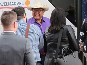 Tsuutíina Chief Lee Crowchild greets guests before a bus tour of new development on the reserve southwest of Calgary on Thursday May 3, 2018. The evening also included a dinner with elders and young native artists at each table to facilitate a discussion of the history and culture of the Nation.
Gavin Young/Postmedia