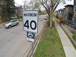 A 40 km/h residential reduced speed zone sign on 12th avenue N.E. in Calgary was photographed on Thursday May 10, 2018. City Council is looking at the possibility of reducing speed limits in residential areas from the current 50 km/h. Gavin Young/Postmedia