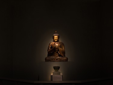 A Buddha in the Glenbow Museum's Art of Asia exhibit was photographed on Wednesday, May 24, 2018. After about 30 years the long running exhibit will soon end.
