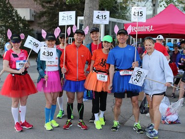 Pace bunnies pose for a group photo before the start of the Scotiabank Calgary Marathon and Half Marathon at Stampede Park on Sunday May 27, 2018.
