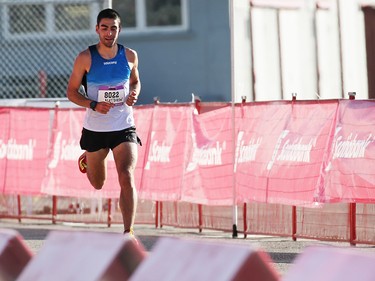 Matthew Travaglini races to first place in the men's division of the Jugo Juice 10 KM event at the Calgary Marathon at Stampede Park on Sunday May 27, 2018.