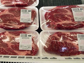 Packaged meat is seen at a grocery store in Montreal, Tuesday, May 19, 2015. A national study says confusing and unecessary best-by labels on food are a major cause of food waste in Canada.