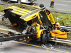 Emergency personnel examine a school bus after it collided with a dump truck, killing two people, on Interstate 80 in Mount Olive, N.J., May 17, 2018.
