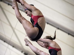 Three-time Olympic medallist Meaghan Benfeito, left, and Caeli McKay practice for the upcoming Canada Cup FINA Diving Grand Prix in Calgary, Alta., Wednesday, May 9, 2018. The competition starts on Thursday and finishes on Sunday. THE CANADIAN PRESS/Jeff McIntosh ORG XMIT: JMC103