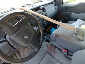 A Saskatoon man says he was cut on the forehead and sustained a concussion after an axe came flying through his truck's windshield, shown in a handout photo. Mackenzie Peddle says he doesn't remember getting hit in the face while he was driving home to Saskatoon from Yorkton, Sask., earlier this month.