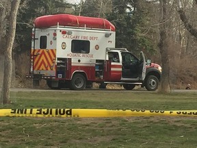 Calgary police on the scene in Stanley Park after a body was found in the Elbow River on Friday, May 4, 2018.