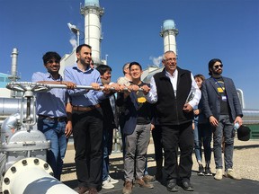 Mehrdad Mahoutian, second from left, and other finalists of the NRG COSIA Carbon XPRIZE competition at the Shepard Energy Centre in southeast Calgary.
