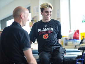 Humboldt Broncos hockey player Ryan Straschnitzki during his physiotherapy with physical therapist Kyle McIntosh at Foothills Medical Centre in Calgary, on Tuesday May 29, 2018. Straschnitzki is scheduled to board a medical flight Wednesday for Philadelphia, where he will continue his rehabilitation at the Shriners Hospital for Children. Leah Hennel/Postmedia