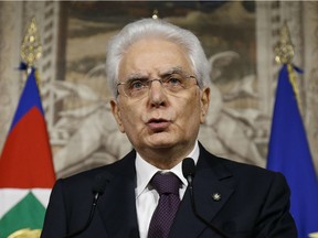 Italian President Sergio Mattarella addresses the media after meeting Italy's premier-designate Giuseppe Conte in Rome, Sunday, May 27, 2018. Italian President Sergio Mattarella said he refused to approve populist leaders' choice of an economy minister who has expressed anti-euro views because the appointment would have "alarmed markets and investors, Italians and foreigners."