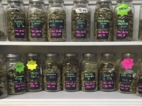In this Sept. 27, 2016, file photo, different strains of marijuana are displayed in West Salem Cannabis, a marijuana shop in Salem, Ore.