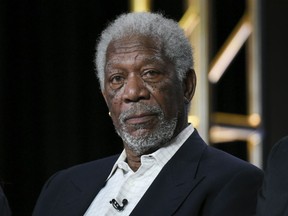 Morgan Freeman participates in the "The Story of God" panel at the National Geographic Channel 2016 Winter TCA in Pasadena, Calif. Freeman says he likes to compliment people to make them feel at ease around him but that he has never sexually assaulted women. The Academy Award-winning actor is fighting back against charges of bad behavior made by multiple women in a CNN report this week.