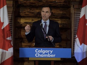 Minister of Finance Bill Morneau speaks to the media in Calgary, Alta., Wednesday, May 30, 2018.THE CANADIAN PRESS/Jeff McIntosh ORG XMIT: JMC104