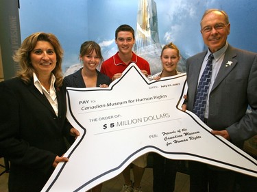 July, 2007: A cheque in the shape of Canadian Museum for Human Rights logo is displayed during a news conference promoting that organization at Metropolitan Centre in downtown Calgary. From left: Margot Micallef, co-chair of Alberta Campaign for Canadian Museum for Human Rights; Samantha Taylor, Nick Taylor, Robyn Marshall, all youths representatives, with CMHR co-chair Frank King. Photo by Ted Jacob/Calgary Herald