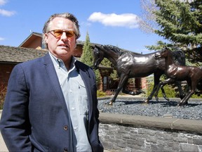 Shawn Hansen, with Hansen Land Brokers, poses for a photo at Clay Riddell's home which is going up for private auctionWednesday, May 2, 2018. Dean Pilling/Postmedia