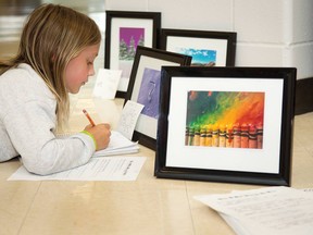 Grade 3 student Ryley of St. Philip School in southeast Calgary writes what taking photographs means to her.