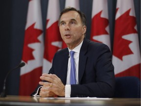 Finance Minister Bill Morneau speaks about the Trans Mountain Expansion project at a press conference in Ottawa on Wednesday, May 16, 2018.