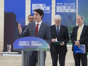 Prime Minister Justin Trudeau announces nearly $40 million in federal funding for a railway underpass and road widening in Edmonton on Tuesday, May 15, 2018.