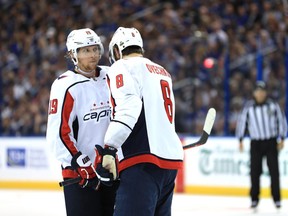 Washington Capitals forwards Nicklas Backstrom (left) and Alex Ovechkin strategize aganst the Tampa Bay Lightning on May 19.