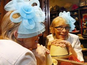 Teri Burgart, manager of Chapel Hats in Chinook Centre, with some of the fascinators on display.