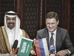 Khalid Bin Abdulaziz Al-Falih, Saudi Arabia's energy minister, left, and Alexander Novak, Russia's energy minister.