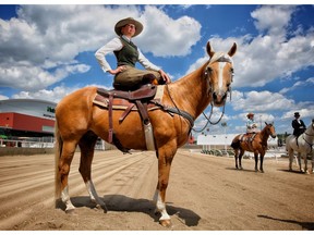 Sam Mitchell poses for a photo on Tuesday June 19, 2018, in the infield at the Stampede grounds where sidesaddle racing will be introduced at this years Calgary Stampede.  Leah Hennel/Postmedia