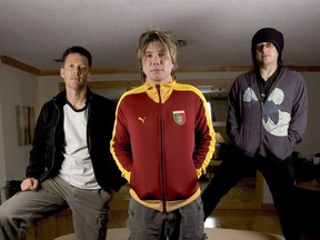 The Goo Goo Dolls  - (from left to right) drummer Mike Malinin, singer-guitarist John Rzeznik and bassist Robby Takac - pose for the Sun at a Toronto hotel yesterday.n/a