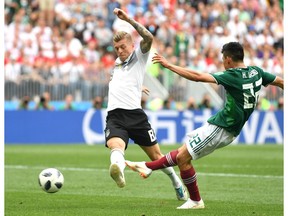 Hirving Lozano of Mexico scores the opening goal during the 2018 FIFA World Cup Russia group F match between Germany and Mexico at Luzhniki Stadium on June 17, 2018 in Moscow, Russia.