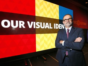 Bob Sartor, president and CEO of The Calgary Airport Authority, stands in front of the new colour scheme for the airport. The Airport Authority announced its new branding on Wednesday June 13, 2018.