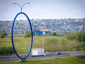 Travelling Light also known as "The Giant Blue Ring" on 96 Avenue NE. Al Charest/Postmedia