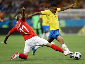 Valon Behrami of Switzerland tackles Gabriel Jesus of Brazil during the 2018 FIFA World Cup Russia group E match between Brazil and Switzerland at Rostov Arena on June 17, 2018 in Rostov-on-Don, Russia.