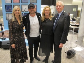 Holt Renfrew's 5th annual charity shopping night in support of the Neonatal Intensive Care Unit at the Foothills Medical Centre was a stunning success. Pictured, from left, are Holt Renfrew's Deb Kerr; headline performer Tim Hicks; Lesley Conway, Calgary Health Trust vice-chair; and Dr. Chris Eagle, Calgary Health Trust president and CEO.