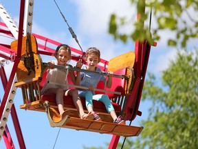 It was fun in the sun at Heritage Park with perfect weather for the park's opening weekend. Visitors ride the ferris wheel on holiday Monday, May 21, 2018. Gavin Young/Postmedia