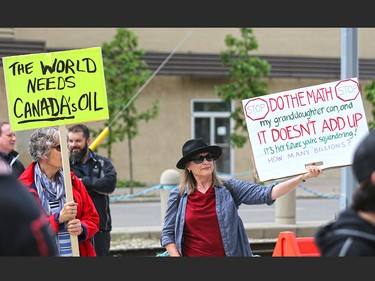 Both pro and anti Trans Mountain pipeline protesters were on hand as anti pipeline protester delivered a petition to Liberal MP Kent Hehr's office in downtown Calgary on Monday June 4, 2018. The petition was demanding a stop to the government's plan to buy Trans Mountain.