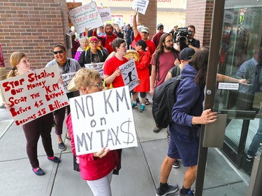 Both pro and anti Trans Mountain pipeline protesters were on hand as anti pipeline protester delivered a petition to Liberal MP Kent Hehr's office in downtown Calgary on Monday June 4, 2018. The petition was demanding a stop to the government's plan to buy Trans Mountain.