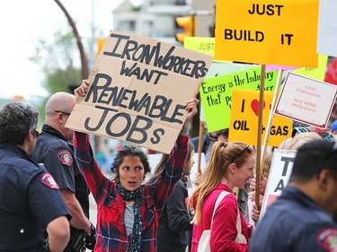 Both pro and anti Trans Mountain pipeline protesters were on hand as anti pipeline protester delivered a petition to Liberal MP Kent Hehr's office in downtown Calgary on Monday June 4, 2018. The petition was demanding a stop to the government's plan to buy Trans Mountain.