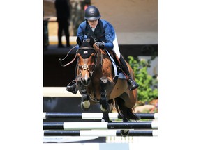 Karen Polle rides With Wings in the ATCO Challenge at the Spruce Meadows National on Wednesday June 6, 2018 Gavin Young/Postmedia