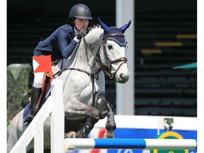 Canada's Vanessa Mannix riding Chemas competes in the PwC Cup on day two at the Spruce Meadows National, Thursday June 7, 2018. Gavin Young/Postmedia