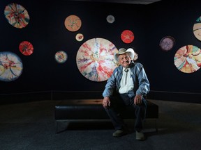 Celebrated Indigenous painter Alex Janvier was photographed in his new exhibit at the Glenbow Museum on Thursday June 14, 2018. Called Alex Janvier: Modern Indigenous Master, the exhibit is organized by the National Gallery of Canada. Gavin Young/Postmedia