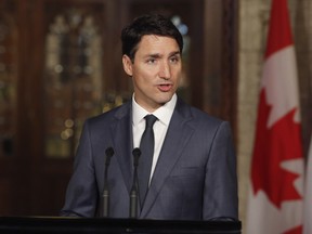 Prime Minister Justin Trudeau speaks at a press conference with French President Emmanuel Macron on Parliament Hill in Ottawa on Thursday, June 7, 2018.