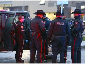 Calgry Police attend to a scene at Chinook Centre following reports of multiple assaults in southwest Calgary on Thursday, May 31, 2018. Jim Wells/Postmedia