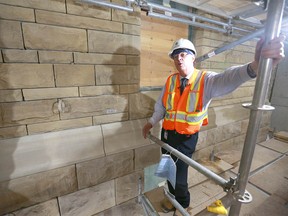 Darrel Bell, Acting Director of Facility Management, City of Calgary shows original and new sandstone exterior on Historic City Hall in Calgary Wednesday, June 27, 2018. The building is undergoing a multi-year, multi-million dollar renovation.Jim Wells/Postmedia
