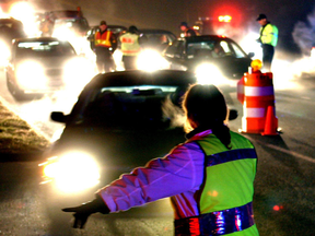 Police pull drivers over as part of Ontario's anti-drinking and driving RIDE program.