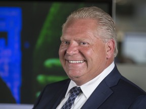 Ontario Premier-designate  Doug Ford arrives at the Postmedia offices in Toronto for an interview with the Toronto Sun on June 8, 2018.
