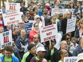 Protestors gather at an anti-Bill 10 rally outside the McDougall Centre   in Calgary on May 14, 2016.